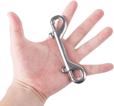 Hand holding 316 Stainless Steel Double Ended Bolt Snap Hook Marine Grade Diving Clips Heavy Duty Trigger Chain Clip Key Holder