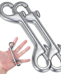 Two 316 Stainless Steel Double Ended Bolt Snap Hooks held in hand, marine grade heavy duty clips for diving, 90mm, silver, key holder, 2 pack.