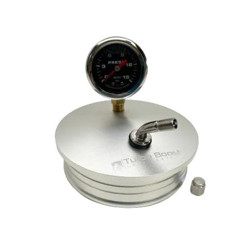 Front view of a 4-inch aluminum boost leak tester end cap with 15 PSI gauge and T-bolt clamp