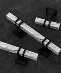 Ten Pack White Marble Grain Kitchen Cabinet Knobs With Black T Bar Hardware Two Tone Square Dresser Drawer Handles on dark surface