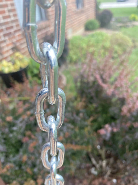 Close-up of bright zinc-plated metal chain outdoors, 3/16-IN X 10-FT Heavy Duty Proof Coil Chain, 800lbs Safe Load Capacity