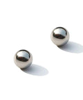 Close-up of two 0.3mm 316L stainless steel balls from 100Pcs 0.3mm Solid 316L Stainless Steel Ball - Smooth Beads Round Balls set