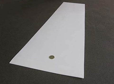 Virgin PTFE Sheet 1/16 Inch Thick 0.062 Inch By 12 Inch By 48 Inch High Purity Polytetrafluoroethylene on dark surface