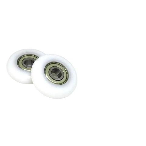 Four Piece Set Of Eight Millimeter Bore Forty Millimeter Outer Diameter Replacement Rowing Machine Seat Rollers Pom Coated Spherical Pulleys on white background.