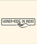 Logo featuring the text 'Handmade in India' with a stylized hand illustration on a beige background.