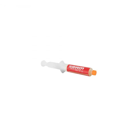 SRAM Butter grease syringe, red label with SRAM logo, white plunger, orange tip
