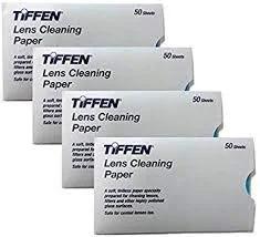 Front view of five Tiffen Lens Cleaning Paper boxes (50 sheets each) for camera lens cleaning.