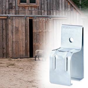Beefy Heavy Duty Box Rail Hanger Brackets for Barn Doors, galvanized steel, shown installed on a wooden barn