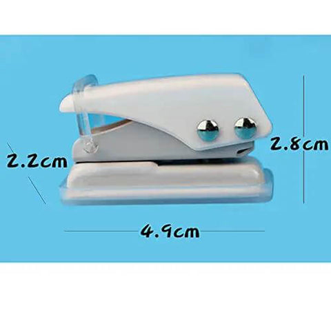 Side view of white handheld hole punch tool showing dimensions; related to Two Pack Small Black And White One Quarter Inch Circle Hole Punch Handheld Tool For Paper And Leather Craft Clean Cut Mess Free Grab And Go Portable Easy To Use Durable Metal For Long Lasting Use Punches Through About Ten Sheets Of Paper Or Leather.
