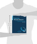 Front view of blue book by Amazon, Industrial Network Security, held by a person; about 9.2 in tall.