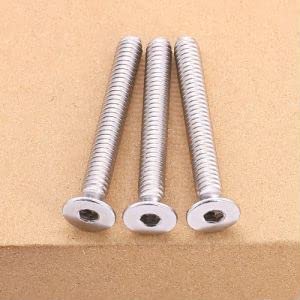 Three 1/4-20 Flat Socket Cap Screws, 2-1/2 Inch Long, Full Thread, Countersunk Head, 304 Stainless Steel 18-8 displayed on a surface