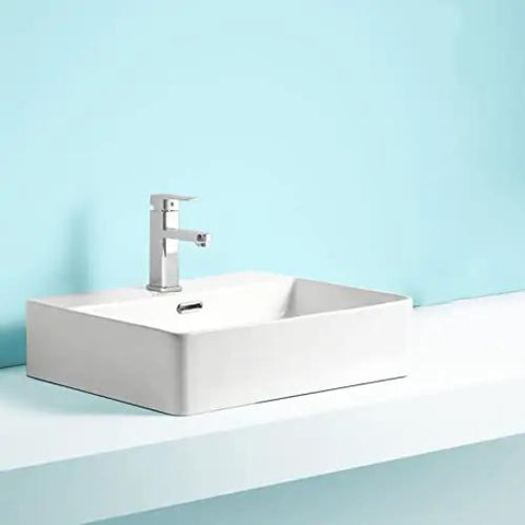 Modern White Rectangular Vessel Sink For Bathroom Counter Crisp Ceramic Basin Sleek Finish Easy Install Super Clean Look That Seriously Levels Up Your Whole Bath Vibe on a white countertop.