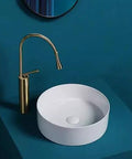 Nordic Vessel Sink - Round Bathroom Washbasin for Countertop, sleek white design with gold faucet, modern home decor.