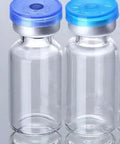 Two 10ml borosilicate glass lab vials with blue flip-off caps, front view
