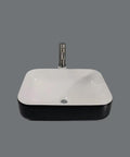 Bathroom Sink Modern Simple Black Appearance Above Counter Basin Ceramic Wash Basin Apartment Home Bathroom Ceramic Above Counter Basin Bathroom Sink Vessel with shiny white surface and black base.