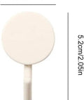 Close-up of a round creamy white peel and stick wall hook, dimensions 2.8cm x 5.2cm, for decorative bathroom organization.