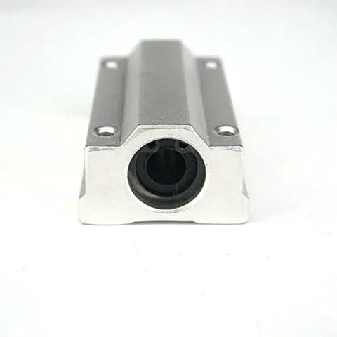 SCS13LUU 13mm Linear Slide Unit Includes Ball Bearings For Dead Smooth Cnc Operation And Rock Solid Stability With A High Quality Bushing Block Ready To Drop In front view of steel bearing block.
