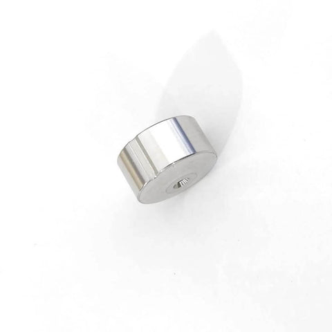 Waterjet check valve seat, chrome-plated metal cylinder with a central threaded bore.