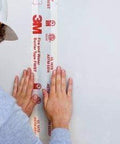 Applying Fire and Water Barrier Tape FWBT4 4 in x 75 ft 1 roll self-adhesive elastomeric firestop seal on wall joint