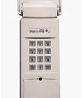 Wireless Garage Door Opener Keypad DC5200 With 4 Digit PIN, front view showing numeric keypad and flip-lid design