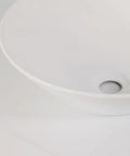 Close-up view of USZWBY Vessel Sinks Bathroom Sink Hotel Apartment Lampshade-Shaped Countertop Art Basin in white ceramic.