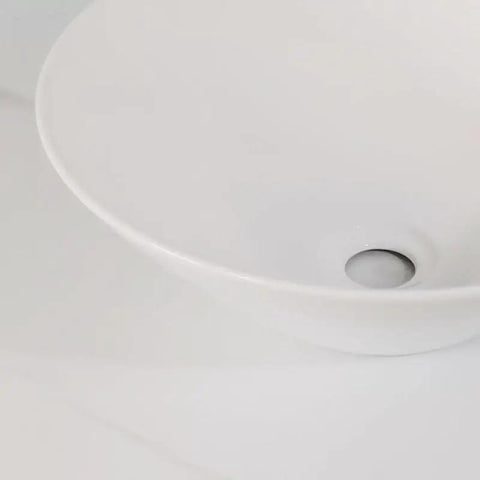 Close-up view of USZWBY Vessel Sinks Bathroom Sink Hotel Apartment Lampshade-Shaped Countertop Art Basin in white ceramic.