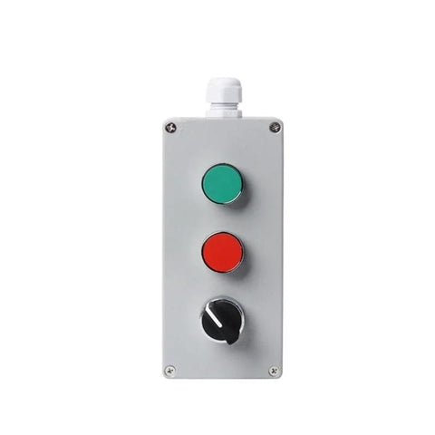 Metal push-button control box panel with green and red buttons and a black rotary knob, top cable gland.