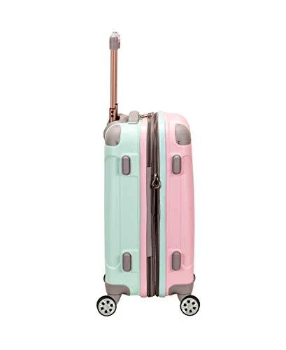 Rockland Melbourne mint pink hardside carry-on luggage, 20-inch expandable spinner, side view with four wheels