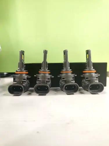 Front view of 9005 9006 LED Bulbs Combo with 100000 Lumens Ultra Bright Daylight 6500K, showing four plug and play bulbs.