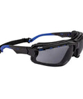 Pro Grade Safety Glasses With Smoke Lenses And Slick Blue Frames Featuring Rubber Gaskets For Zero Fog Nonsense Rock Solid Comfort Versatile Adjustment And Bulk 12 Pack Workplace Ready Eye Protection side view of safety glasses with rubber gaskets.