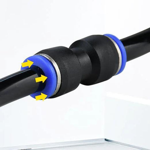 Close-up of PU4 tube fitting and PC4-M6 pneumatic straight fitting on 4mm PTFE tube; black body with blue collars