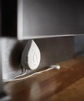 Flo Smart Water Leak Detector 3 Pack device installed under cabinet for home water sensor alarm with real-time alerts and round-the-clock monitoring.