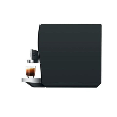 Next Level Automatic Coffee Maker Featuring Hot And Cold Brew Options Smart Touchscreen Interface And Built In Grinder For Barista Style Morning Drip Vibes, side view with espresso.