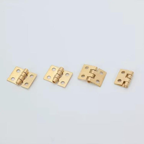 1:12 Scale Miniature Door Hinges With Screws, Set Of 4 For Dollhouse Doors And Cabinets. Display of four brass-colored hinges.