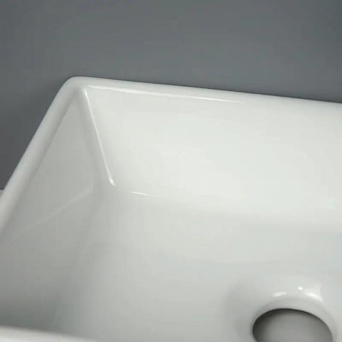 Close-up of USZWBY Vessel Sinks Ceramic Vessel Sink Modern Minimalist Wall-Mounted Washbasin Square Washing Bowl.