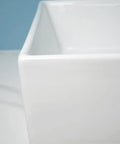 Close-up view of USZWBY Vessel Sinks Modern Minimalist Home Balcony Ceramic Wash Basin with a square flat bottom.