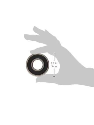 SKF Power Steering Pump Shaft Bearing 62032RSJ held in hand, size reference 2.2 inches, fits AMC Audi Buick Cadillac Chevrolet Dodge Ford Honda.