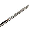 Close-up of metal punch tool from Pro Grade Heavy Duty Die Punch Snap Kit Rivet Setter With Base. Textured grip and tapered tip visible.