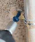One Quarter Inch By Three And One Quarter Inch Tapcon Hex Washer Head Concrete Screw For Anchoring To Masonry Brick Or Block in use