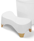 Squat Toilet Stool For Adults And Kids, 7 Inch Tall, Non Slip Poop Stool With 550 Lbs Capacity, White And Bamboo Color in bathroom.