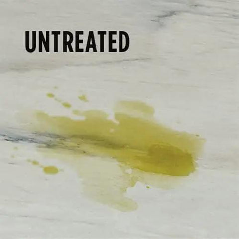 Stain on untreated marble surface highlighting the need for Pro Grade Nano Quartzite Sealer Plus Heavy Duty Stone Guard Solvent Based Impregnating Formula Shields Marble Granite Concrete Travertine Keeping Counters Lookin Spotless Year Round 1 Quart Jug.