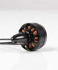 X2206S Brushless Outrunner Motor For Rc Multirotor Drones 2100Kv And 2380Kv Cw And Ccw Pair, showcasing gold copper windings and black casing.
