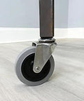 3-Inch Swivel Stem Caster With Non-Marking TPR Rubber Wheel attached to furniture, shown installed on a light-colored floor.