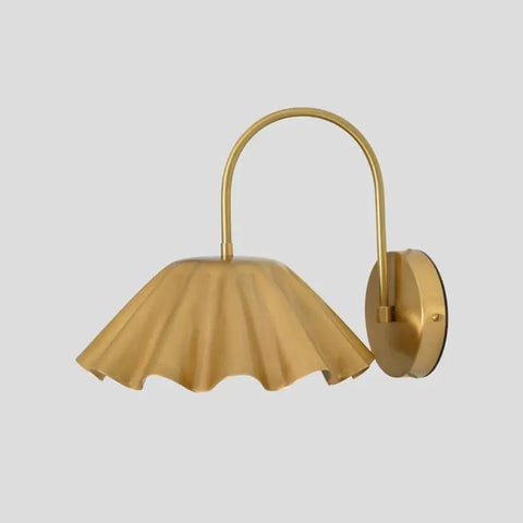 SHAHLUMES Handcrafted Curved Brass Flower Wall Sconce in matte black, elegantly curved design, ideal for bedroom or hallway lighting.