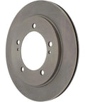 Front brake rotor, gray cast-iron with central bore and wheel holes; fits Chevrolet Tracker and Suzuki Vitara.