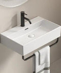 HAOCHRYSYPH Ceramic Wall Mount Sink with Towel Rack, Milk White, 23.63 in. rectangular sink with towel bar and faucet.