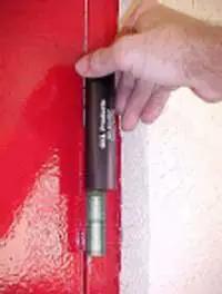 Ha1 Hinge Repair Tool Six Pack For Quick Fix Of 4.5 By 4.5 Non Ball Bearing Door Hinges Made In USA in use on red door.