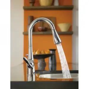 Top Shelf One Handle Pull Down Kitchen Faucet Featuring Power Boost Technology And Reflex Docking System In Spot Resist Stainless Finish For No Sweat Cleanup with water stream.
