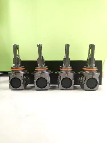 Front view of 9005 9006 LED Bulbs Combo with 100000 Lumens Ultra Bright Daylight 6500K, 4-pack on green background.