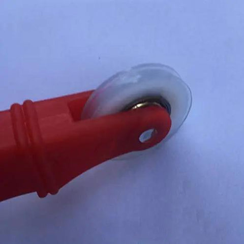 Close-up of Heavy Hitter Double Head Window Roller With Plastic Handle featuring a clear wheel for pressing rubber strips into window screens.